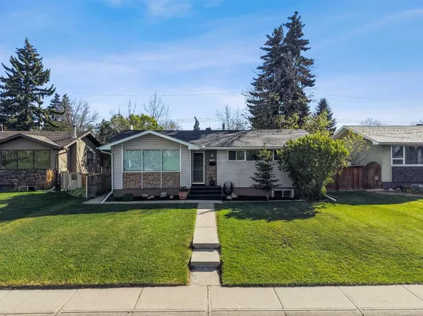 2420 W Langriville Dr SW, Calgary, AB T3E 5G8