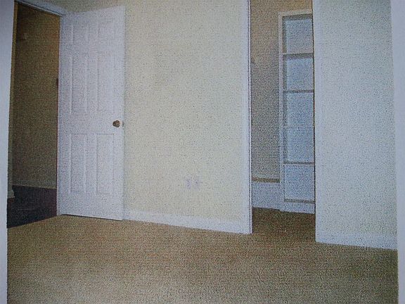 Spacious master bedroom with walk in closet