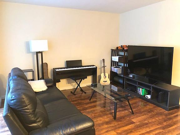 A great space to hang out! Bookshelf, TV and stand are yours to use during your tenancy if you wish.