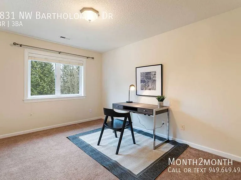 9831 NW Bartholomew Dr — Photo 19