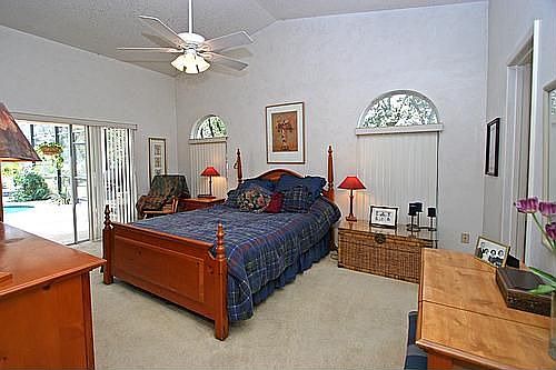 M/Bedroom w/sliding doors out to pool area