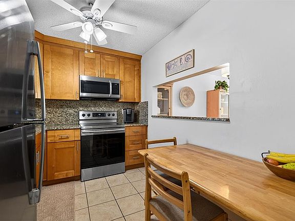4th image of 7625 SUN ISLAND DRIVE S #207