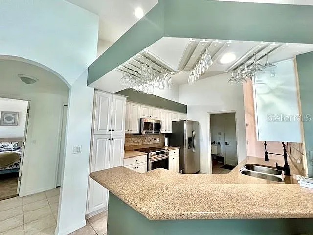 426 NW 37th Pl — Photo 13