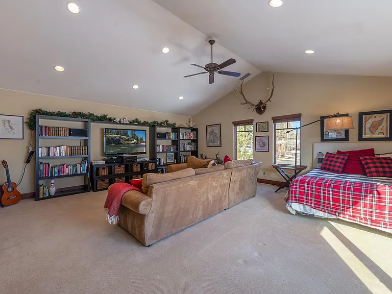 Family room/spare bedroom with larger closet, wet bar and giant Roku TV with PlayStation