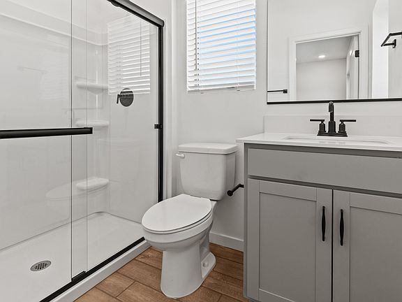 Primary bath with matte black accents
