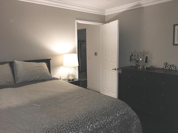 Master bedroom with private restroom and balcony