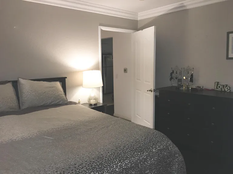 Master bedroom with private restroom and balcony