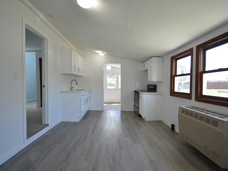 Kitchen, Dining area as you come out of bedroom