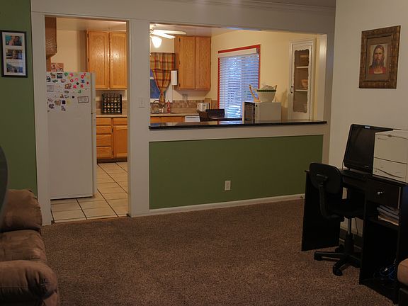 family room upstairs looking into the kitchen