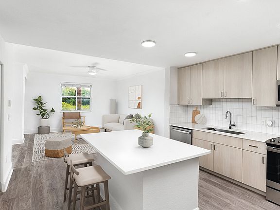 Select homes feature upgraded kitchens with quartz countertops
