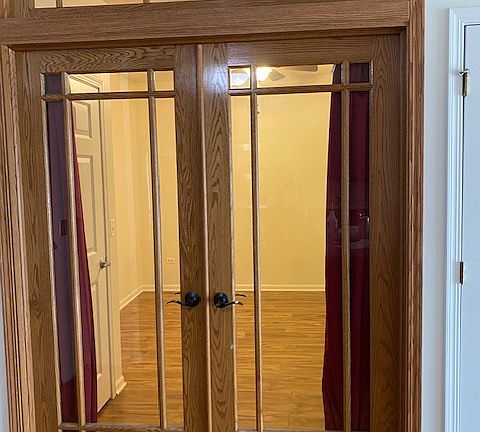 Den/office - new laminate floors- easy to clean. Closet is on the left side.