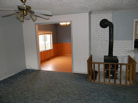 The first floor interior is very open. The dining room is to the left and the kitchen to the right, 