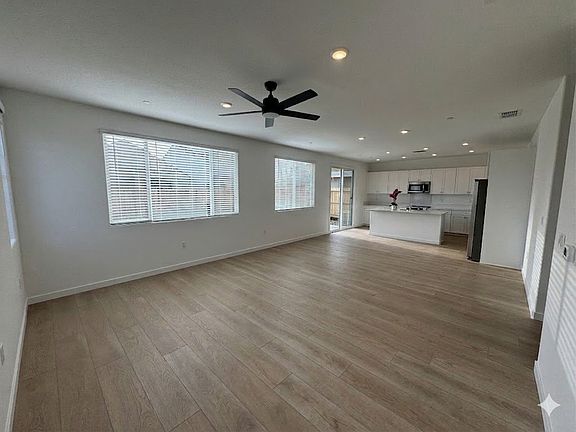 Spacious great room and dining room combo with a lot of natural light
