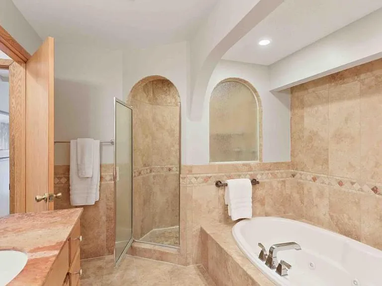 Owner's suite bathroom with soaking tub