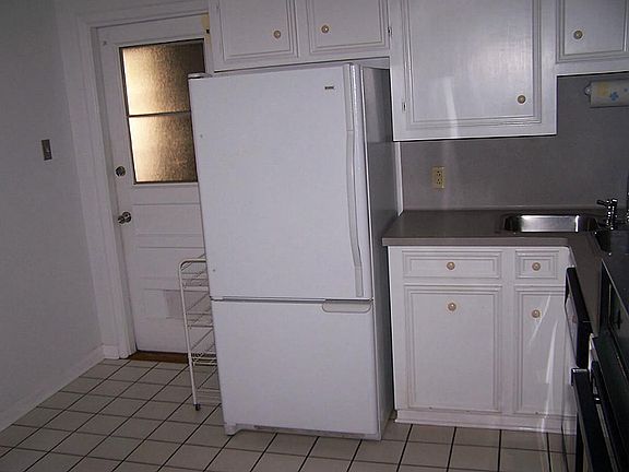 Refrigerator, counter, door to utility/storage
