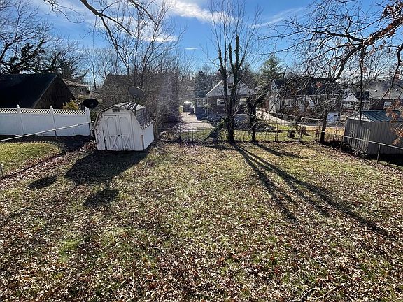 Huge backyard with storage shed