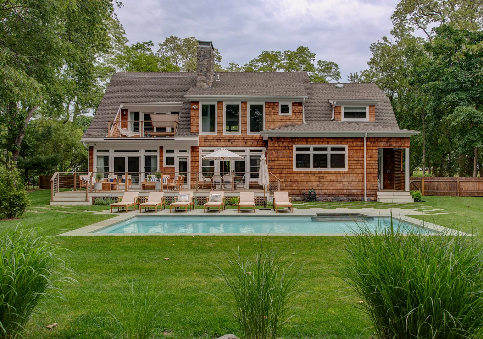 Modern Coastal Farmhouse style home with a private pool — Photo 1