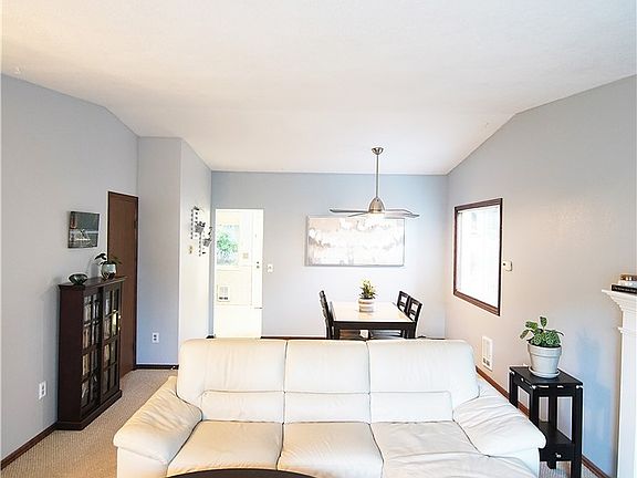 Family & dining room with vaulted ceiling! coat closet to the left. 