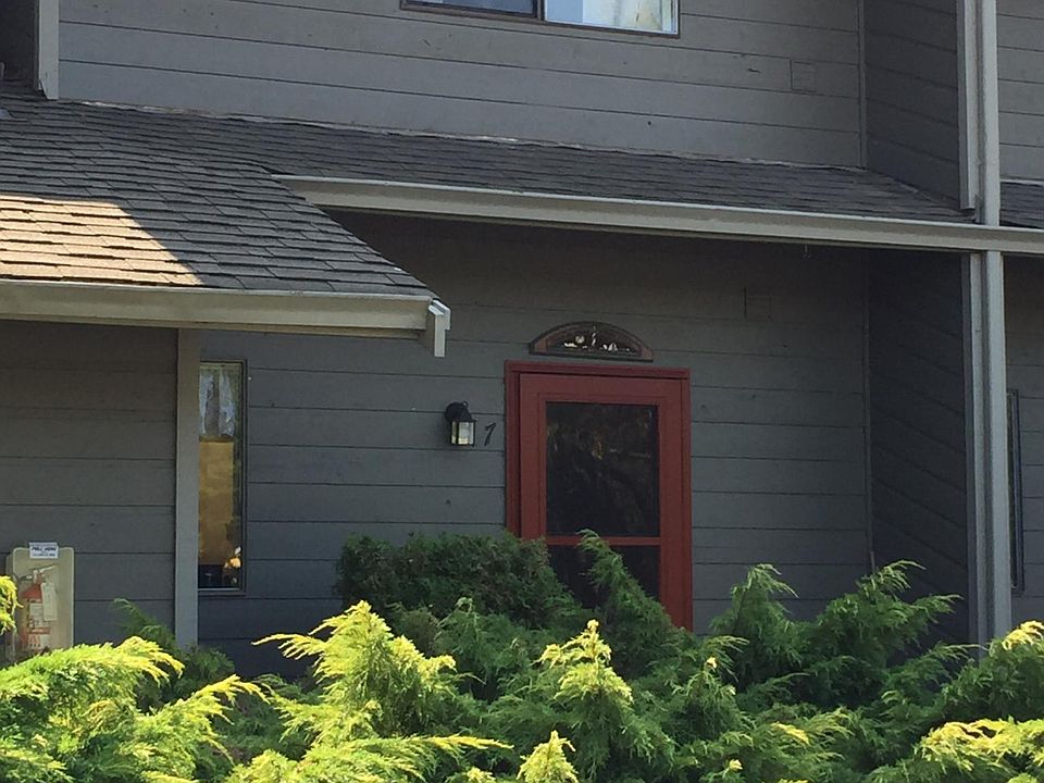 Welcoming front door. Two story townhouse style condominium. Very private and friendly well managed compound.