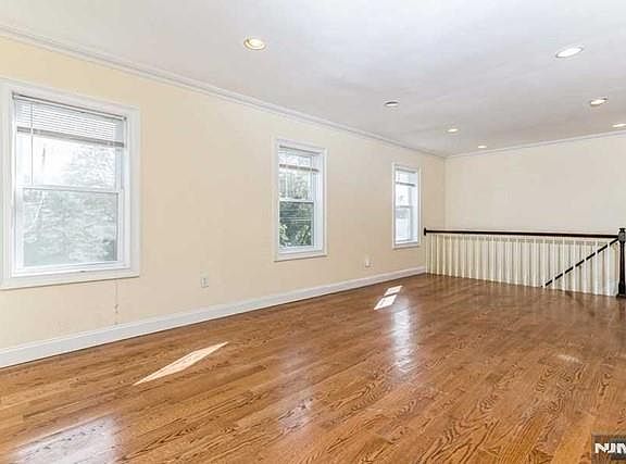 Living Room- spacious and bright floors have been refinished and room has been painted
