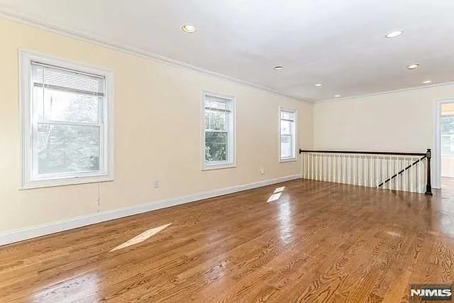 Living Room- spacious and bright floors have been refinished and room has been painted