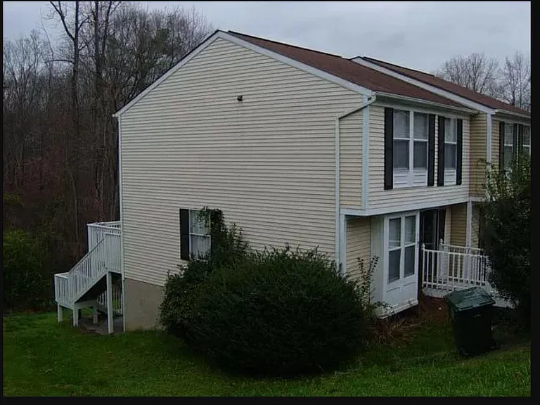 The main floor is 2nd floor, huge bedroom, bath/shower, enclosed storage, and laundry room on lower first floor with door to lower deck. Top floor is 2 big equal-sized bedrooms with one bath/shower. Good floor plan for room-mates, families and many oth