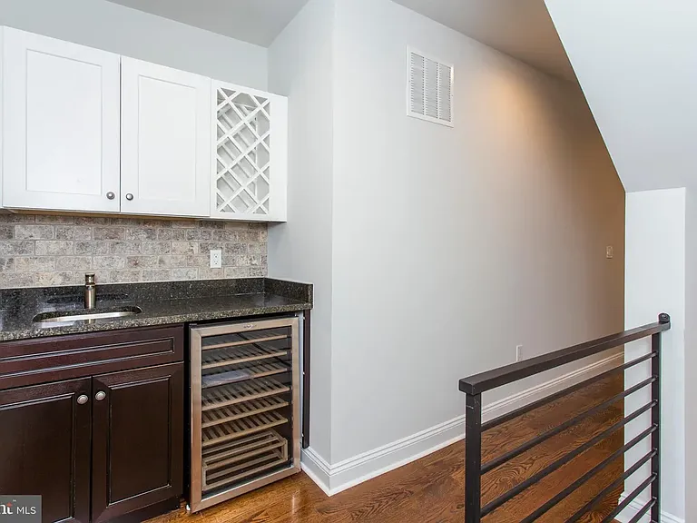 Wet bar at top of third floor on your way to the roof deck!