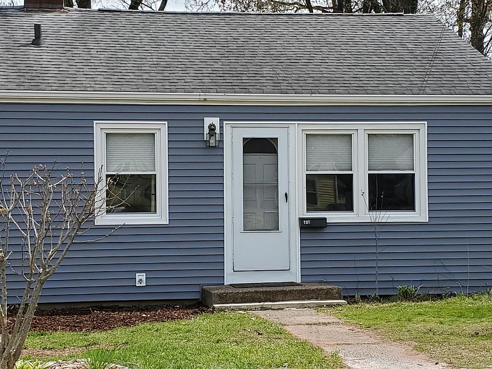 Front stoop. Brand new siding.