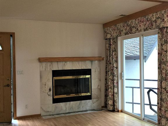 Living room with marble fireplace