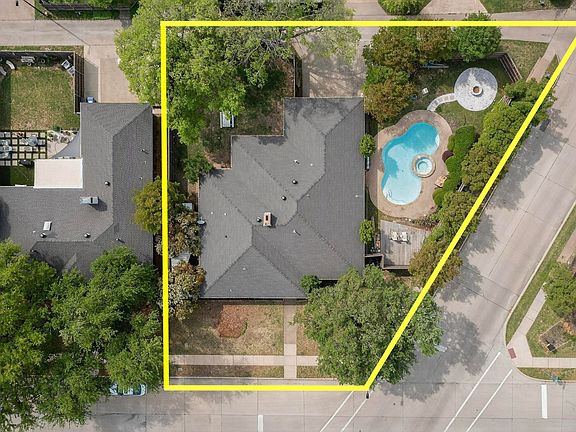Aerial view of home with 2 separately fenced back yards