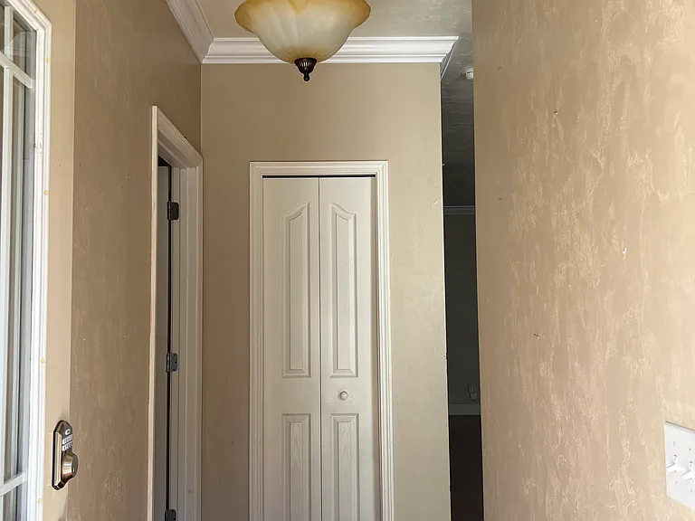 Entrance view with coat closet