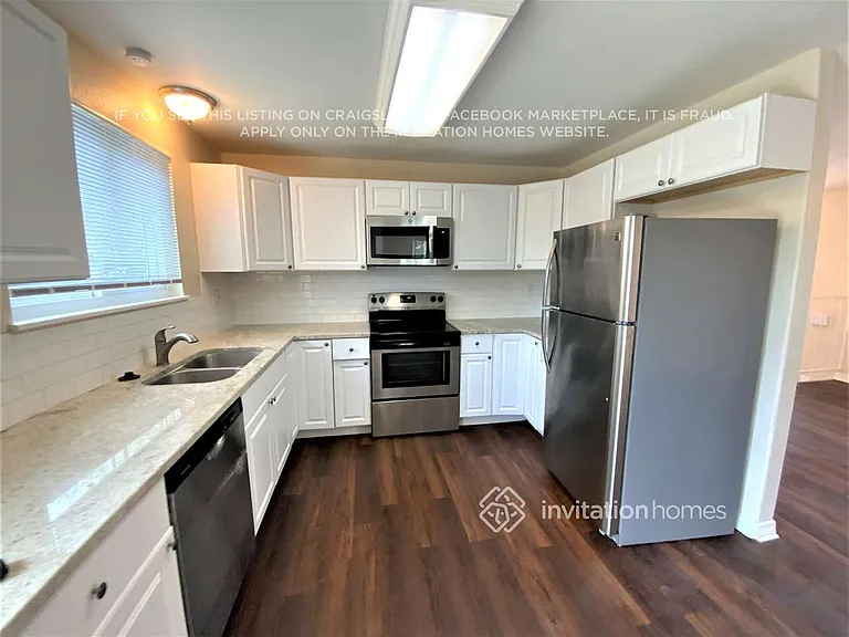 3147 S Ouray St — Photo 4