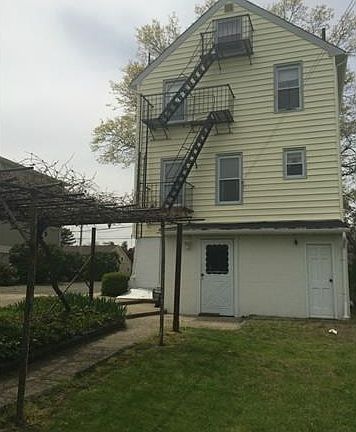 rear exterior & rear entrance to unit 1