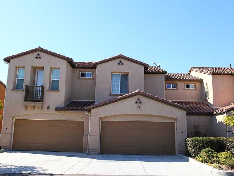 back view (2-car garage and driveway at right)
