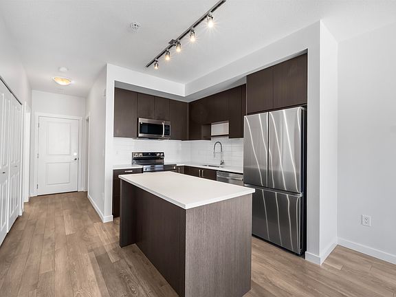 2nd image of 15848 Fraser Hwy #408
