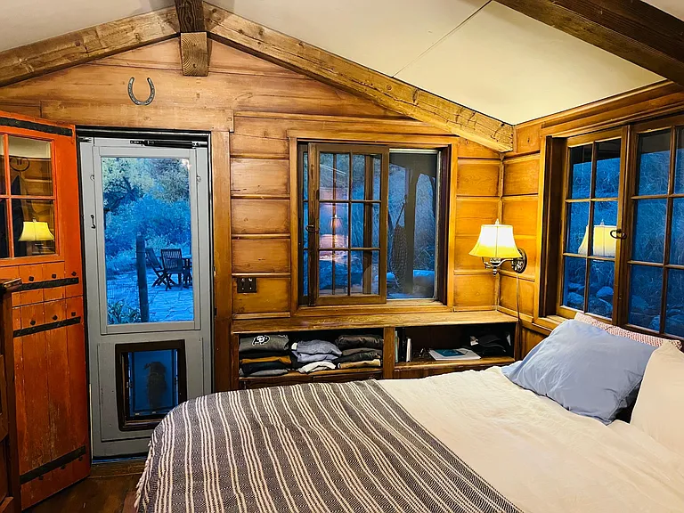 master bedroom opening on to open space with views of Chautauqua and the first Flatiorns.