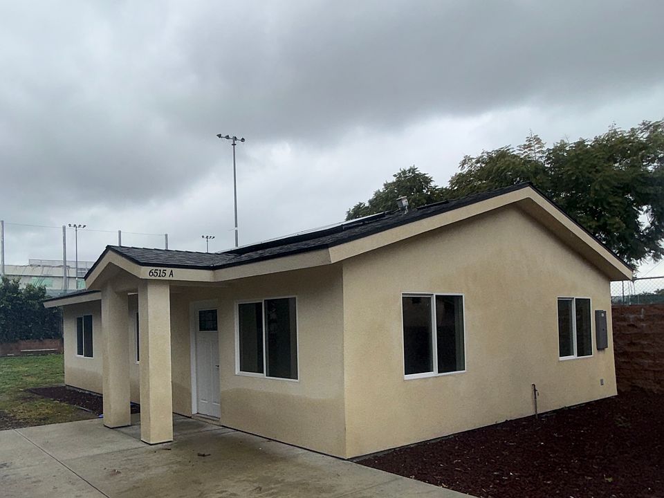 Brand New, Newly Built Private Detached Home. Secluded in Rear of Property with Solar Panels and Central HVAC.