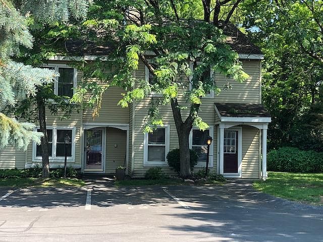 2 Reserved Parking Spots Directly in Front of House with Additional Parking in Foreground