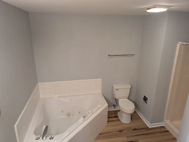 Jacuzzi tub and shower in Primary Bedroom
