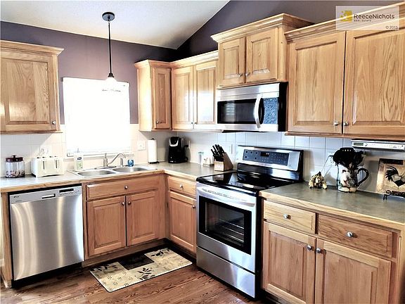 Window at sink, stainless appliances, and great counter space!