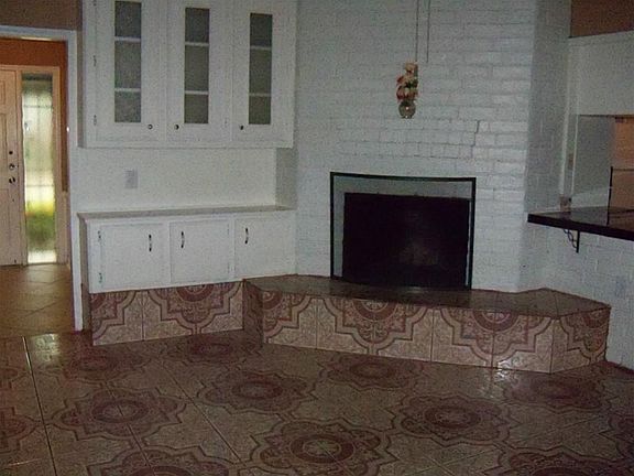 Den with fireplace