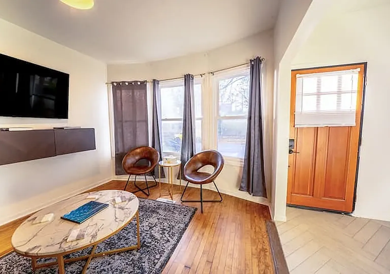 Spacious 2BR Upper Unit + Finished Attic 250 move-in credit offered through end of the month** — Photo 2