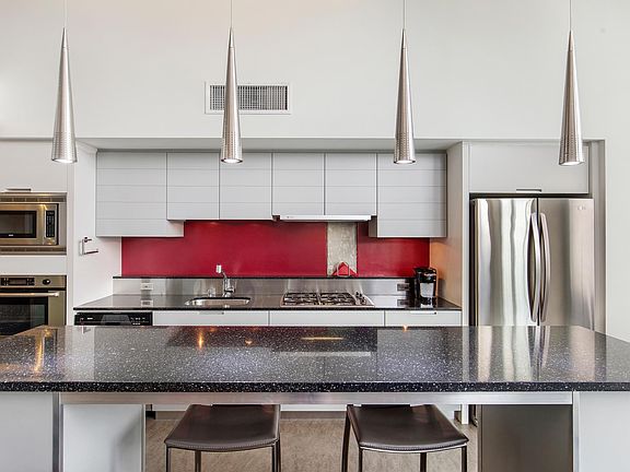 Kitchen/ Dining island with storage.