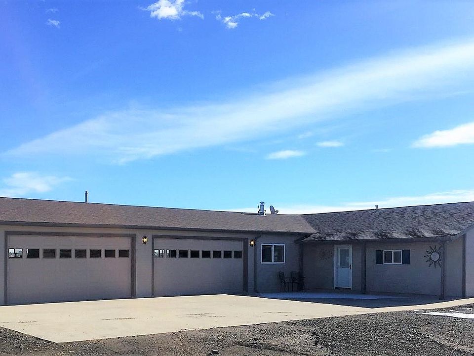You get half of the above garage. Privacy wall installed.
