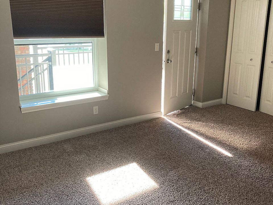 LIVING ROOM DOOR - CLOAT CLOSET AND WINDOW WITH BLIND