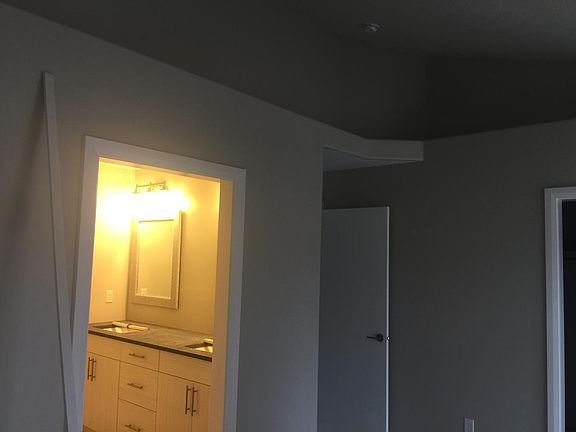 view in to master bathroom from master bedroom