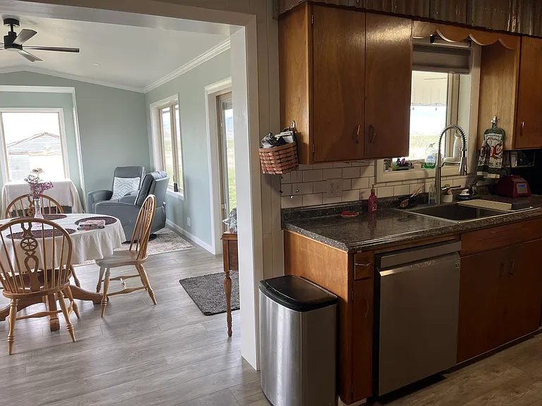 Kitchen with dishwasher and farm sink
