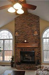Great room has soaring vault.
