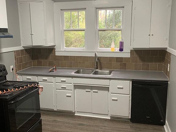 Kitchen from walkway to bathroom