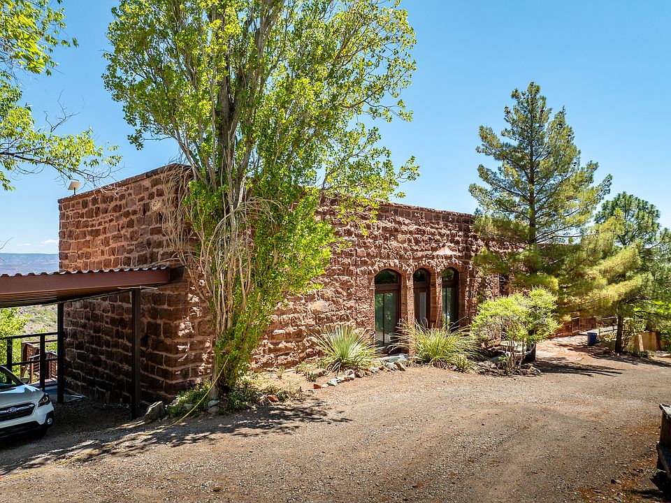 Front of historic, stone home.